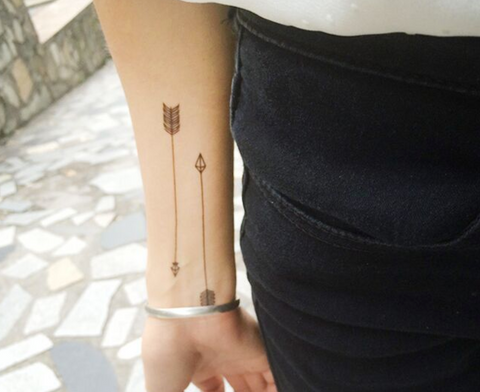 The Meanings Behind The Arrow Tattoo: A Growing Trend | Arrow tattoos for  women, Small arrow tattoos, Arrow tattoos